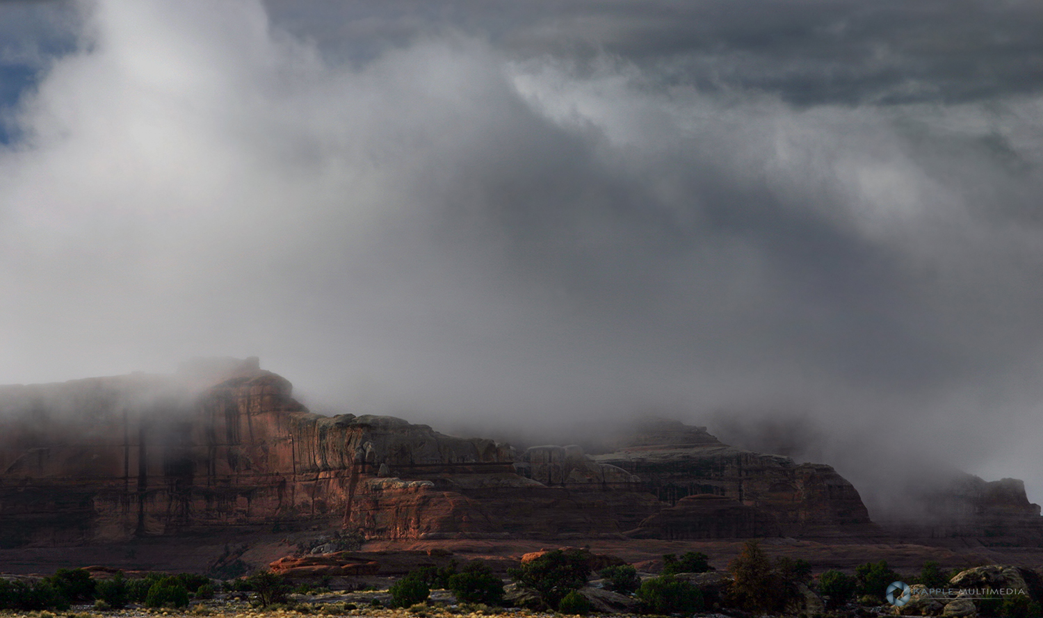 Storm gathering over the Needles District of the Canyonlands National Park, Utah, USA